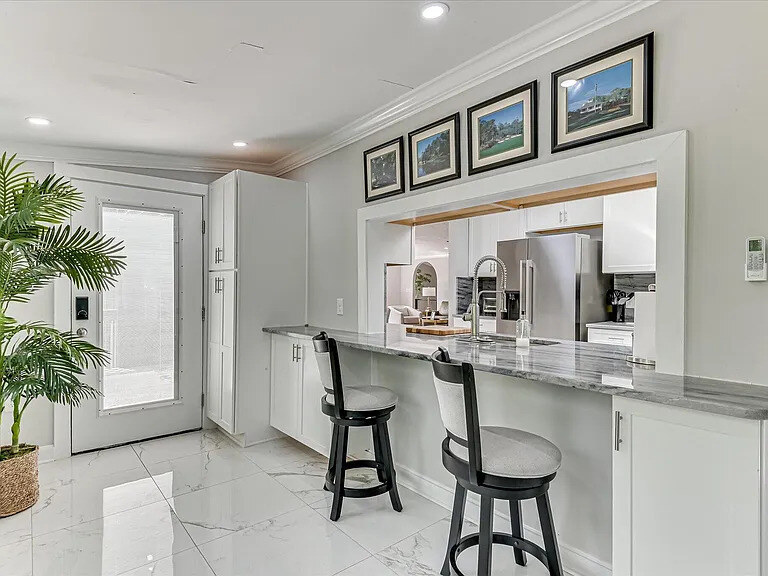 Kitchen marble floors and backsplash