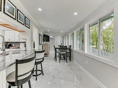 Kitchen range and marble backsplash