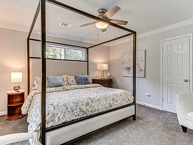 Master bedroom with canopy bed